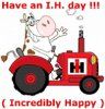 happy_cow_on_ih_tractor_sign.jpg